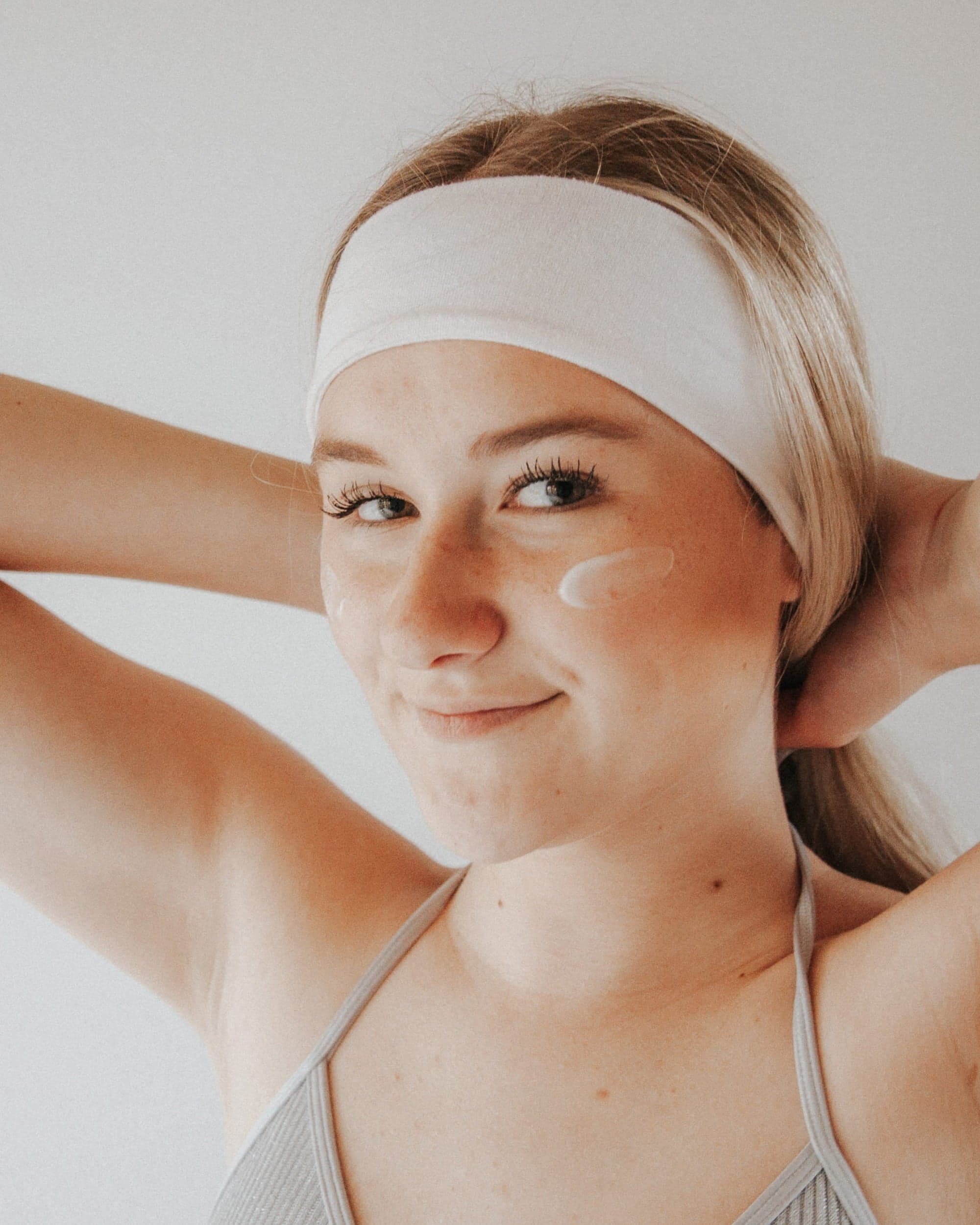 Woman stretching with headband